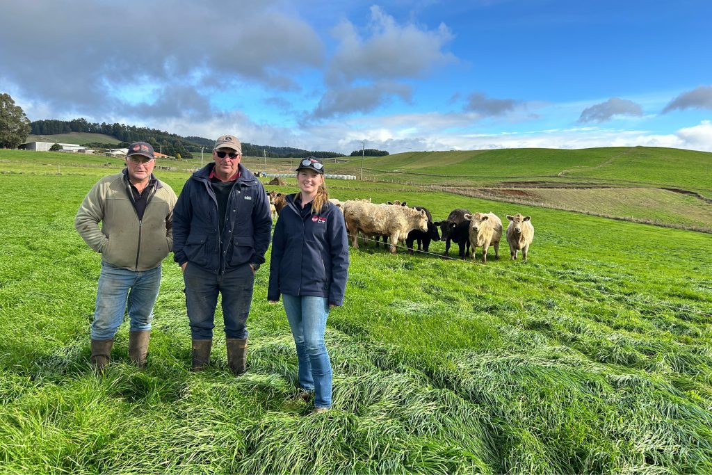 Rodney Saltmarsh, Darryl Saltmarsh and agronomist Jennah Horton stand in a paddock